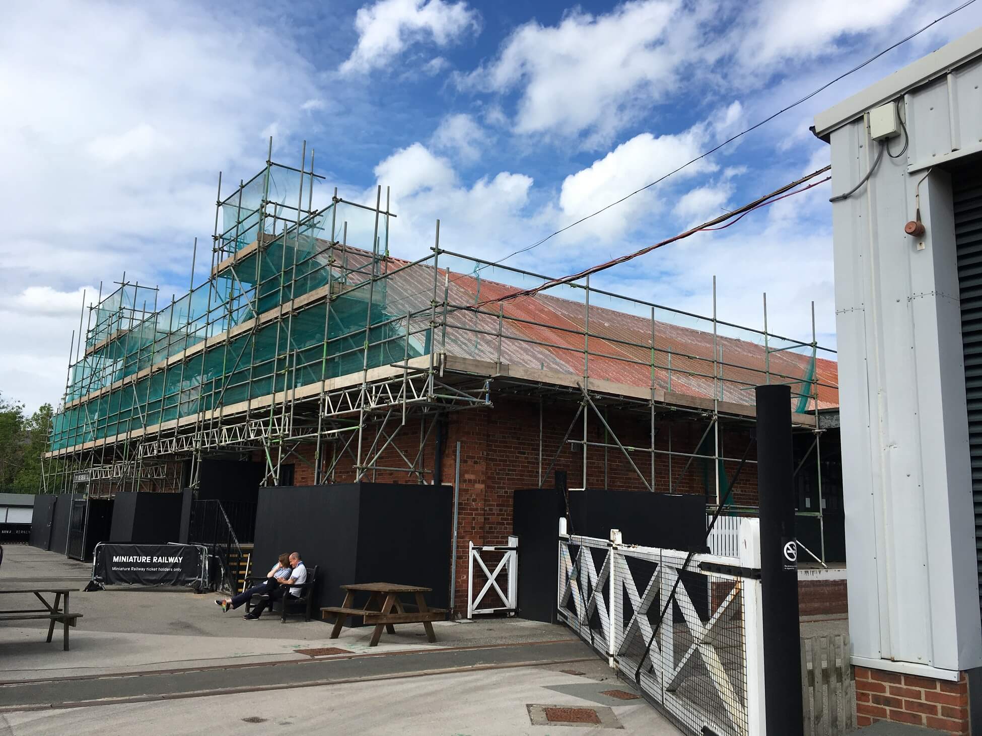 erected Commercial scaffold with a green netting