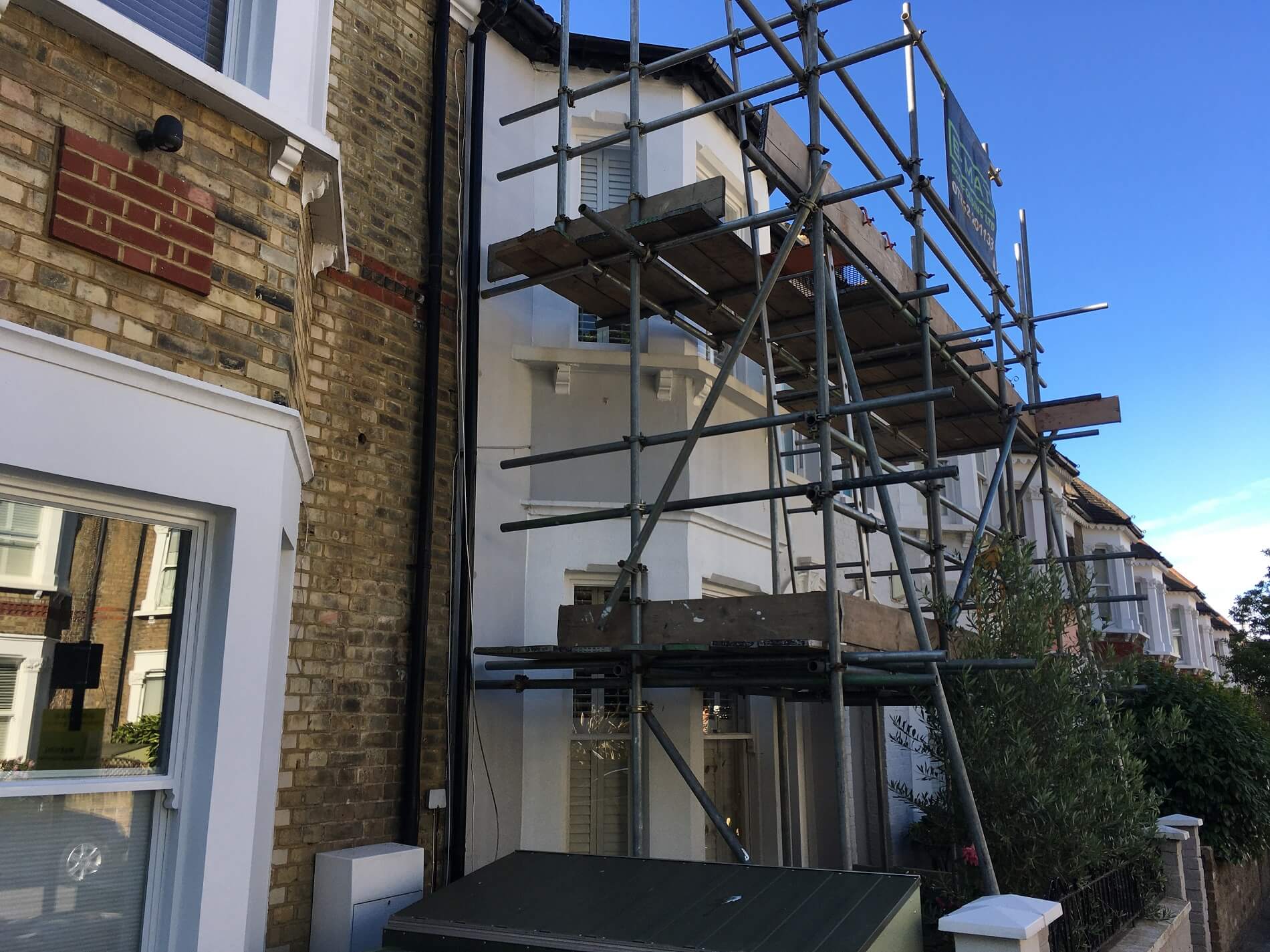 Erected scaffold on front of a house