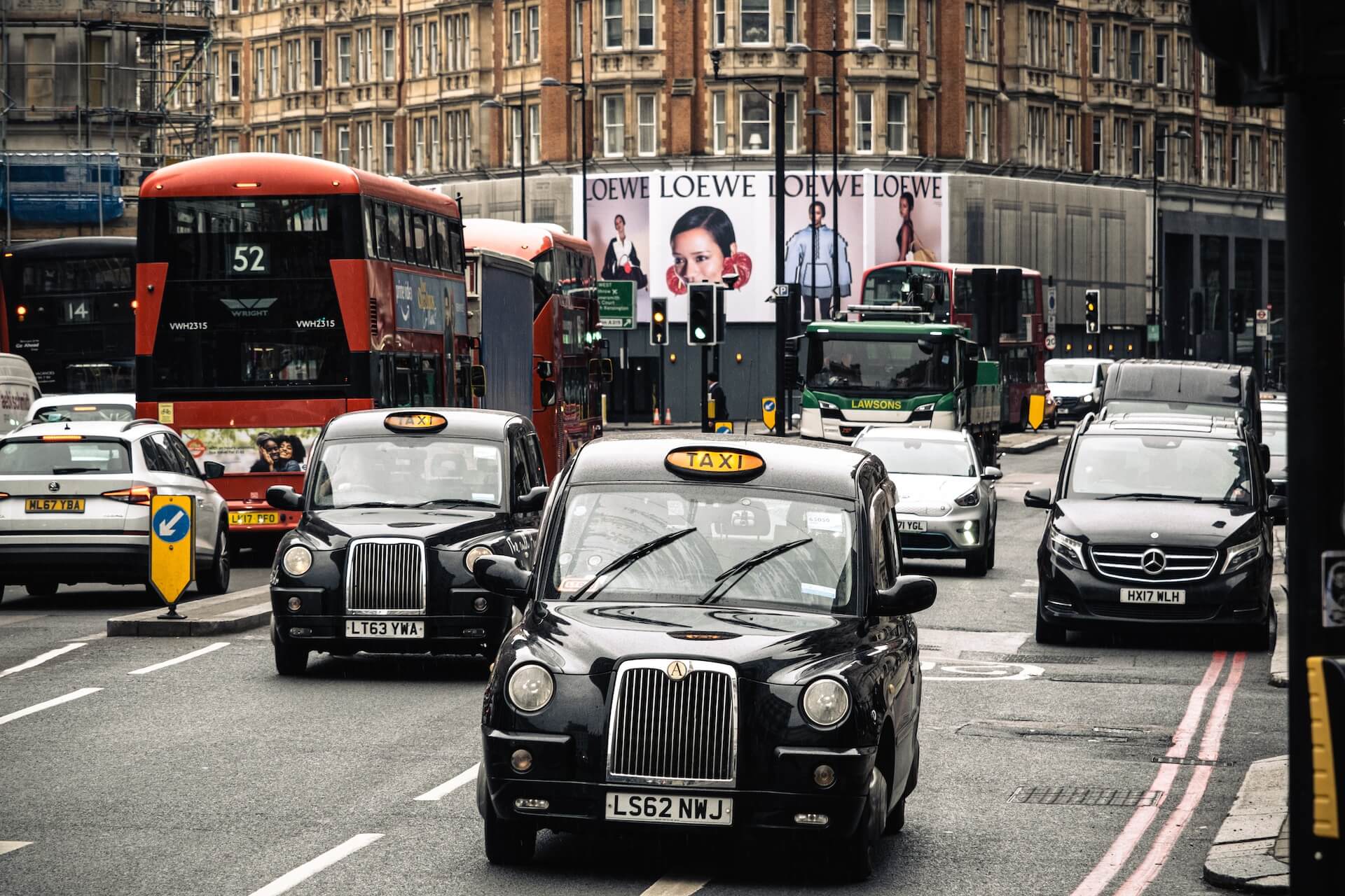 busy Hight-street-London, black London cab